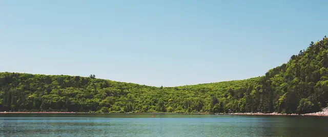 Wooded bluffs along the shore of Devil's Lake, Wisconsin